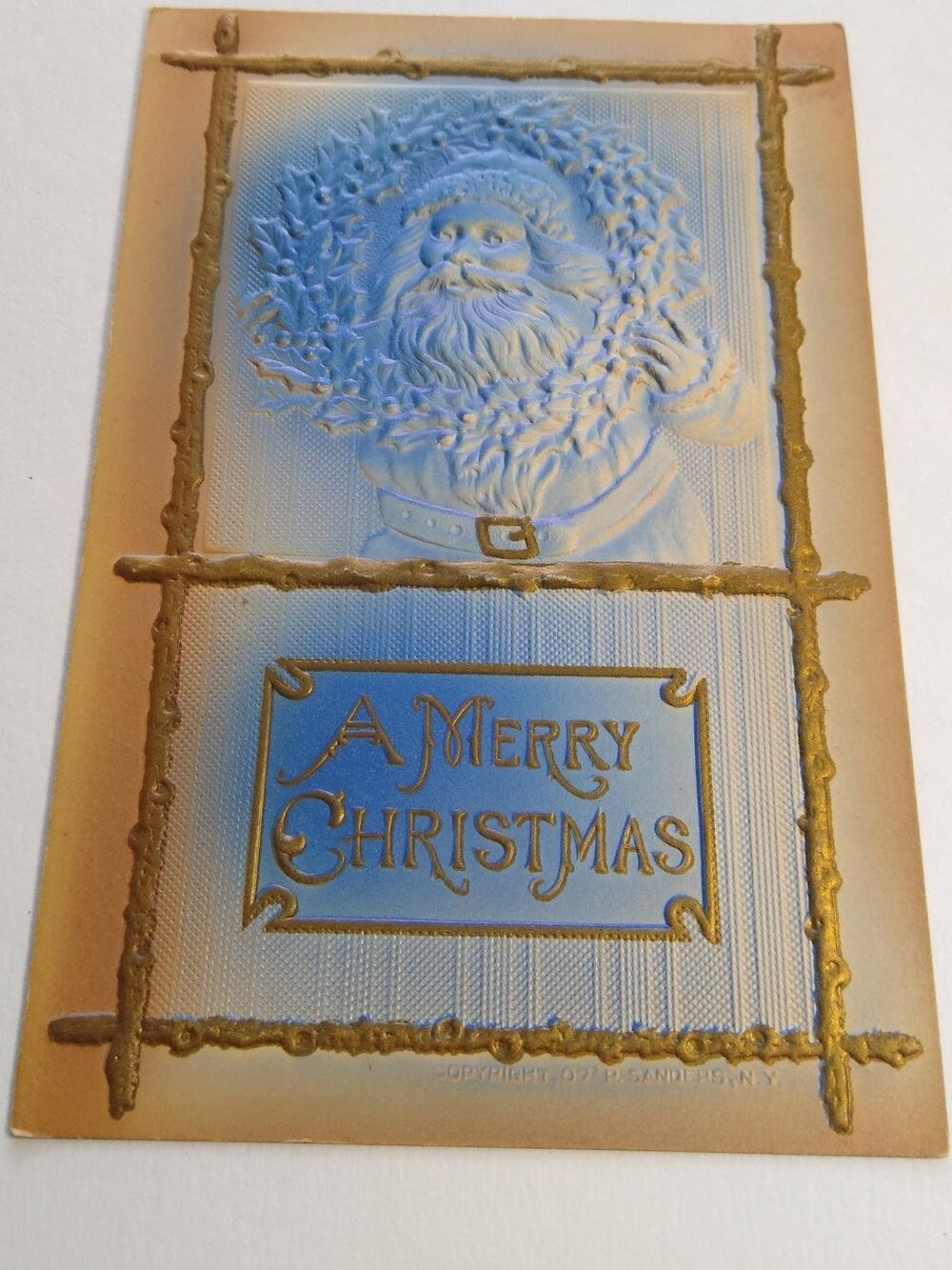 1907 Embossed Santa Claus Christmas Postcard S. Sandberg NYC Holiday Wreath